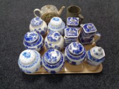 A tray of eleven Ringtons tea pots, lidded vases, ginger jars,