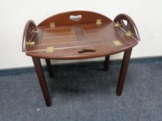 A mahogany butler's tray on stand