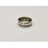 A two shillings 1942 ring,
