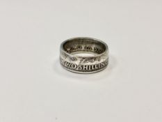 A two shillings 1942 ring,