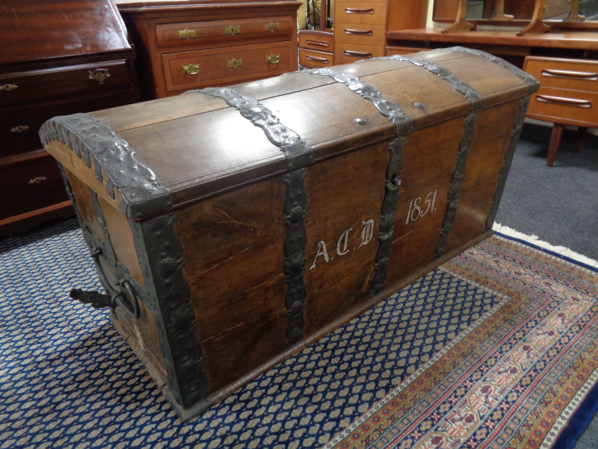 A 19th century oak and metal bound shipping trunk