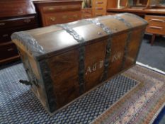 A 19th century oak and metal bound shipping trunk