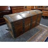 A 19th century oak and metal bound shipping trunk