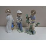 Three Nao figures - Boy seated on branch no. 1353, Girl with puppy and doll.