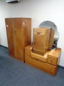 A three piece 1930's oak bedroom suite