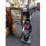 A Vax upright vac together with a mid century frameless mirror and one further hall mirror