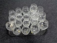 A tray of crystal and glass brandy glasses