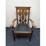 An oak Arts & Crafts armchair
