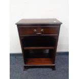 A reproduction side cabinet fitted with a drawer