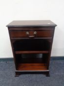 A reproduction side cabinet fitted with a drawer