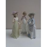 Three Nao figures - Girl with candle,