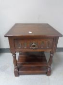 A Jaycee Oak lamp table fitted a drawer