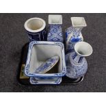 A tray of Oriental wares including blue and white planter on stand,