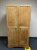 A pine double door wardrobe