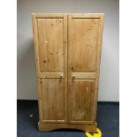 A pine double door wardrobe