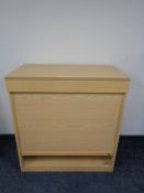 Two wooden effect shutter door stationary cabinets