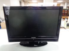 A Toshiba 19 inch LCD TV / DVD with remote
