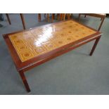 A Danish tiled topped coffee table