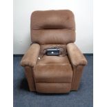 An electric reclining armchair