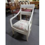 An early 20th century painted armchair