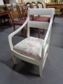 An early 20th century painted armchair