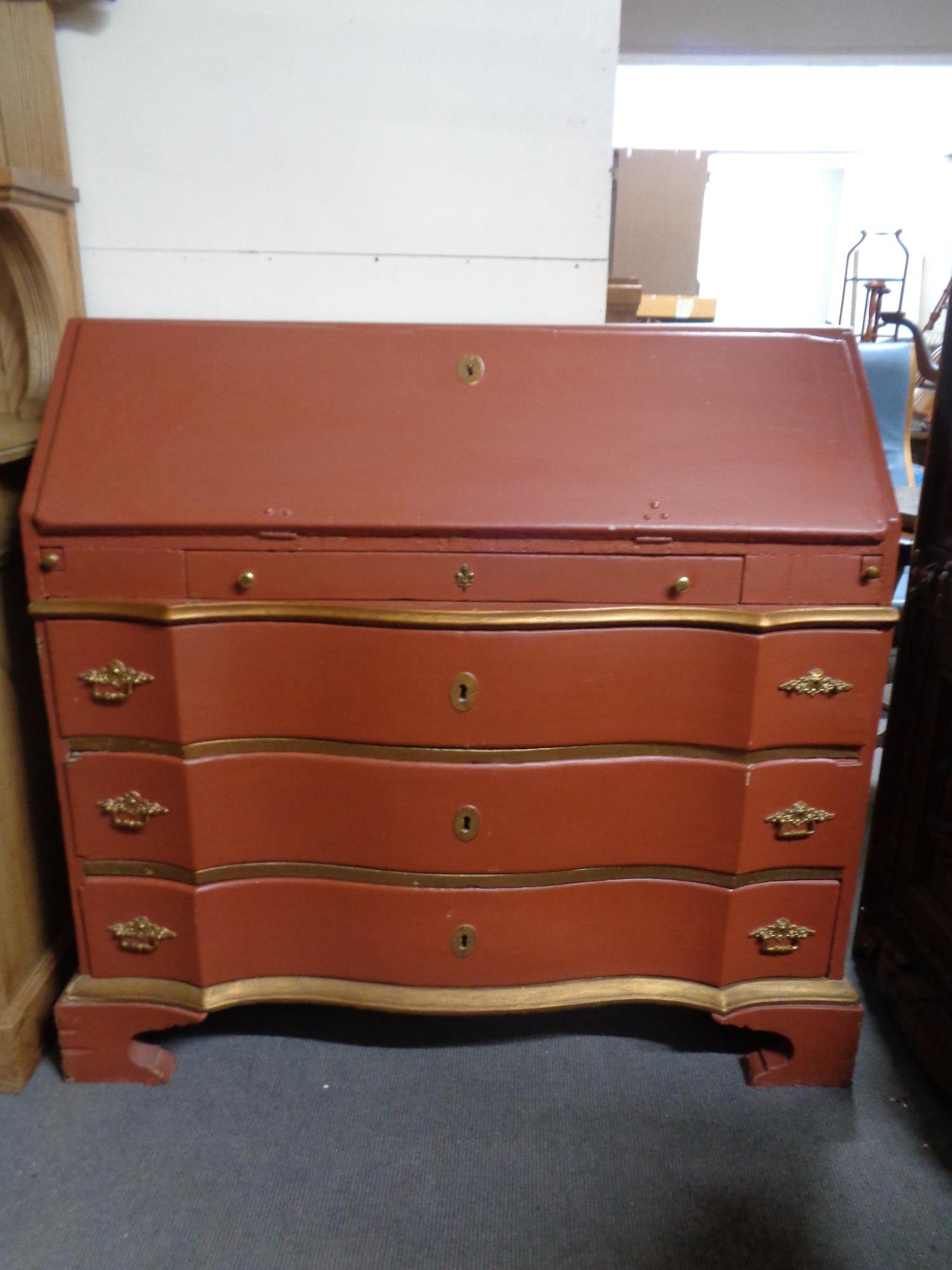 A painted oak serpentine fronted bureau