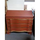 A painted oak serpentine fronted bureau