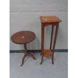 An Edwardian plant stand and a pedestal wine table