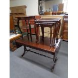 A mahogany drop-end coffee table on brass feet together with a circular two-tier occasional table