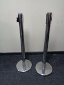 Two metal security bollards