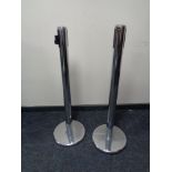 Two metal security bollards