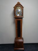 A continental granddaughter clock with moonphase dial