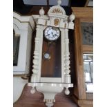An early 20th century eight day wall clock in painted case (a/f)