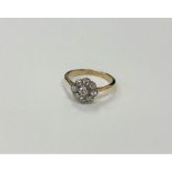 An antique 18ct gold diamond floral cluster ring