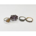 Four silver gem set dress rings