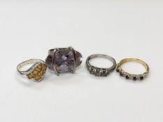 Four silver gem set dress rings