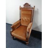 A late 19th century oak and walnut gent's armchair