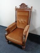 A late 19th century oak and walnut gent's armchair