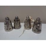 Four Continental silver salt and pepper sellers
