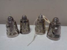 Four Continental silver salt and pepper sellers