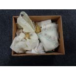 A box of table linens, doilies,