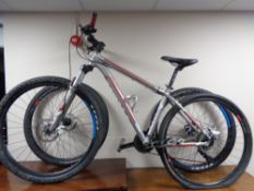 A Trek Wahooo mountain bike and an extra set of wheels