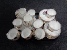 A tray of forty two piece Royal Stafford roses to remember tea service