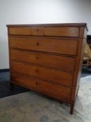 A late 19th century continental inlaid oak five drawer chest CONDITION REPORT: