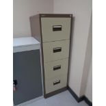 A four drawer metal filing chest