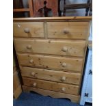 A pine six drawer chest