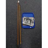 Two cane fishing rods and a collection of monochrome photographs, Newcastle FA cup winners 1950,