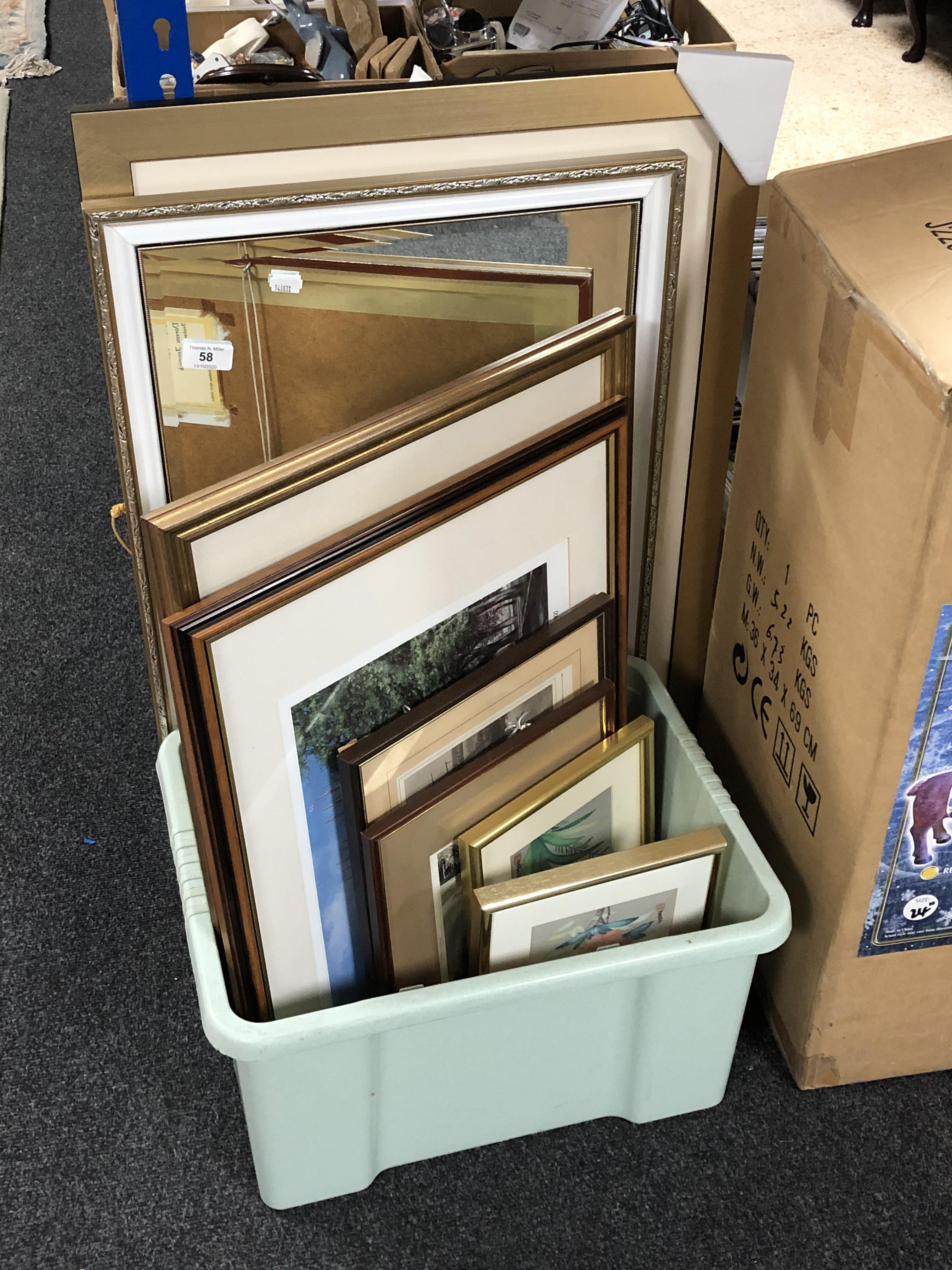 A gilt framed bevelled mirror and a box of pictures and prints