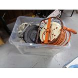 A box of electrical cables and extension leads