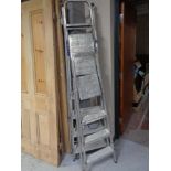Three aluminium ladders